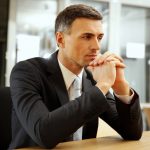 20170731103748-businessman-thinking-meeting-leader-serious